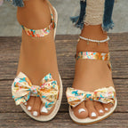 Trendsi floral bowknot ankle strap flat sandals for women, summer shoes with comfortable design and stylish floral accents.