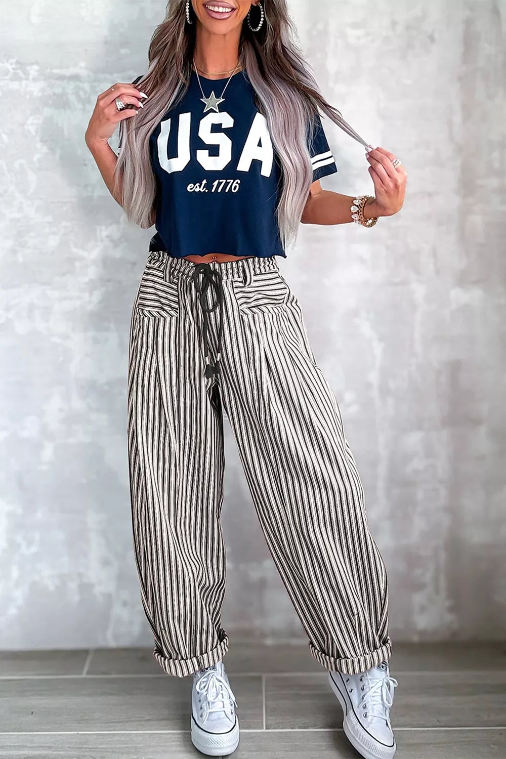 Light beige stripe drawstring casual loose pants from Trendsi, featuring a relaxed fit and comfortable waistband.
