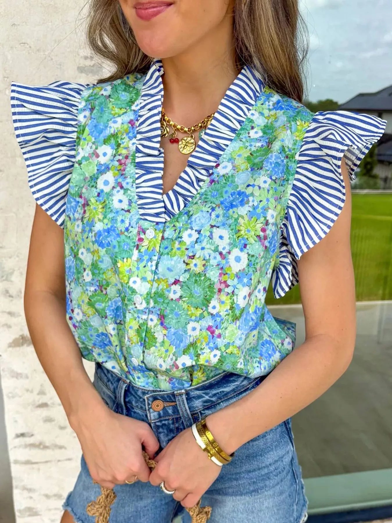 Floral patchwork flutter sleeve V-neck cotton blouse, lightweight dress with a relaxed fit and colorful floral design.