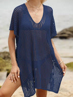 Openwork V-neck slit cover-up by Trendsi, lightweight and stylish beachwear with intricate openwork design and V-neck detail.