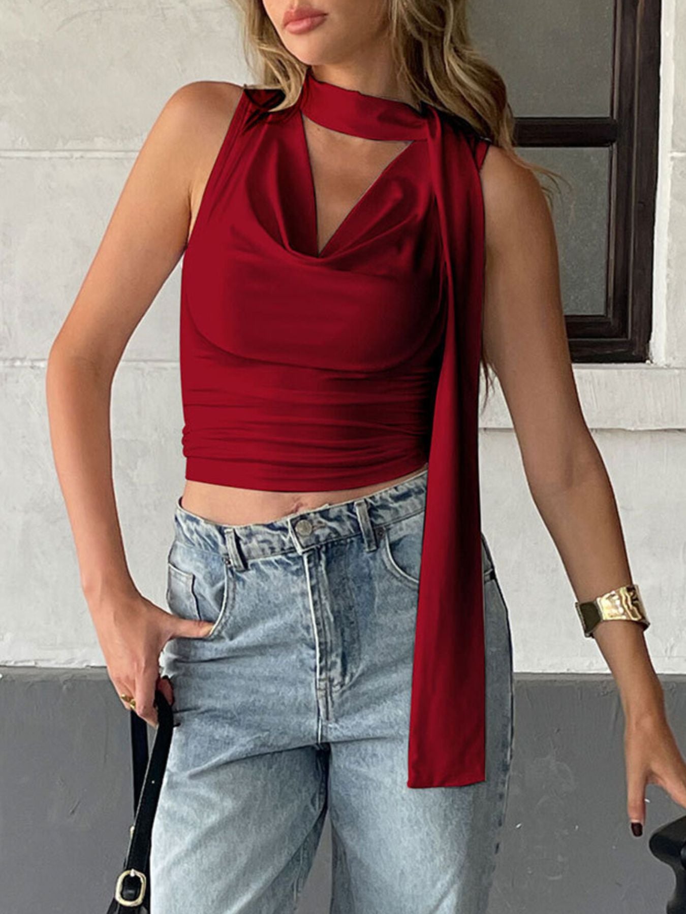 Satin-feel sleeveless cowl neck blouse with ruched detailing, elegant and versatile top by Trendsi.