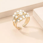 Pearl 18K gold-plated open ring with a single pearl accent, stylish jewelry piece from Shopimist on a white background.