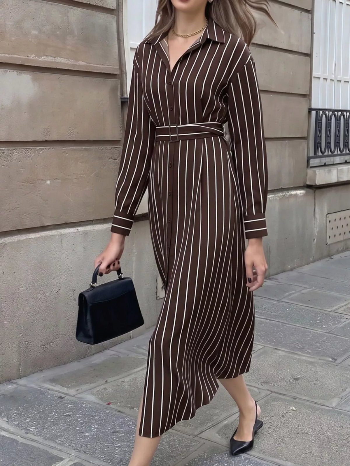 Striped long sleeve belted shirt dress for women by Trendsi, featuring a classic design with a waist belt and button-front detail.