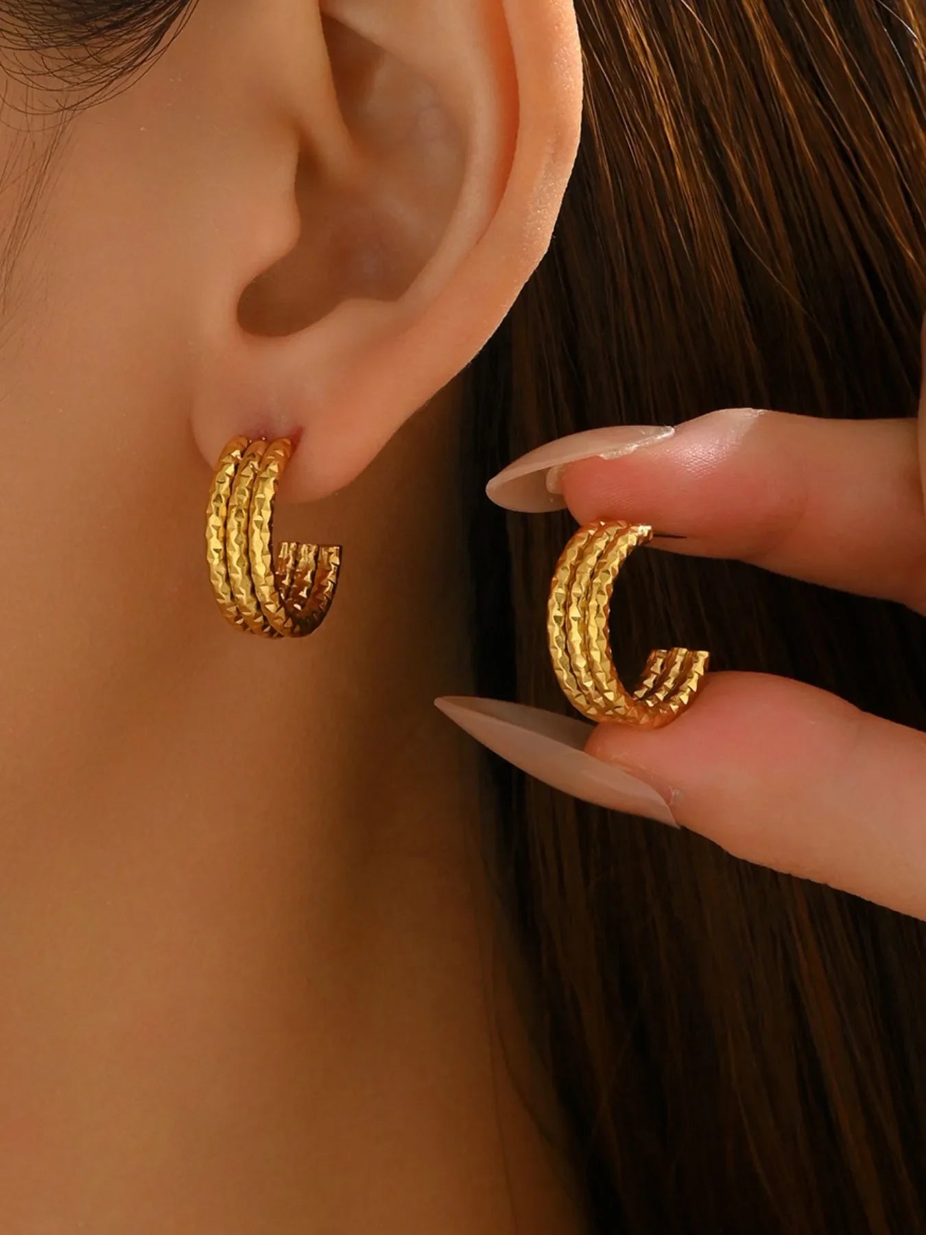 18K gold-plated textured triple band hoop earrings with a stylish design, featuring multiple hoops in a polished gold finish.