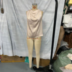 Women's elegant sleeveless mock neck top by FitiqueFit, casualwear, shown in a stylish, fitted design with a smooth fabric finish.