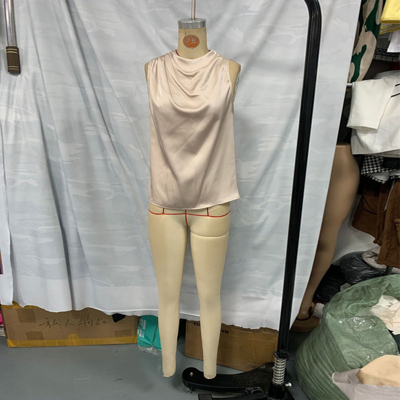 Women's elegant sleeveless mock neck top by FitiqueFit, casualwear, shown in a stylish, fitted design with a smooth fabric finish.