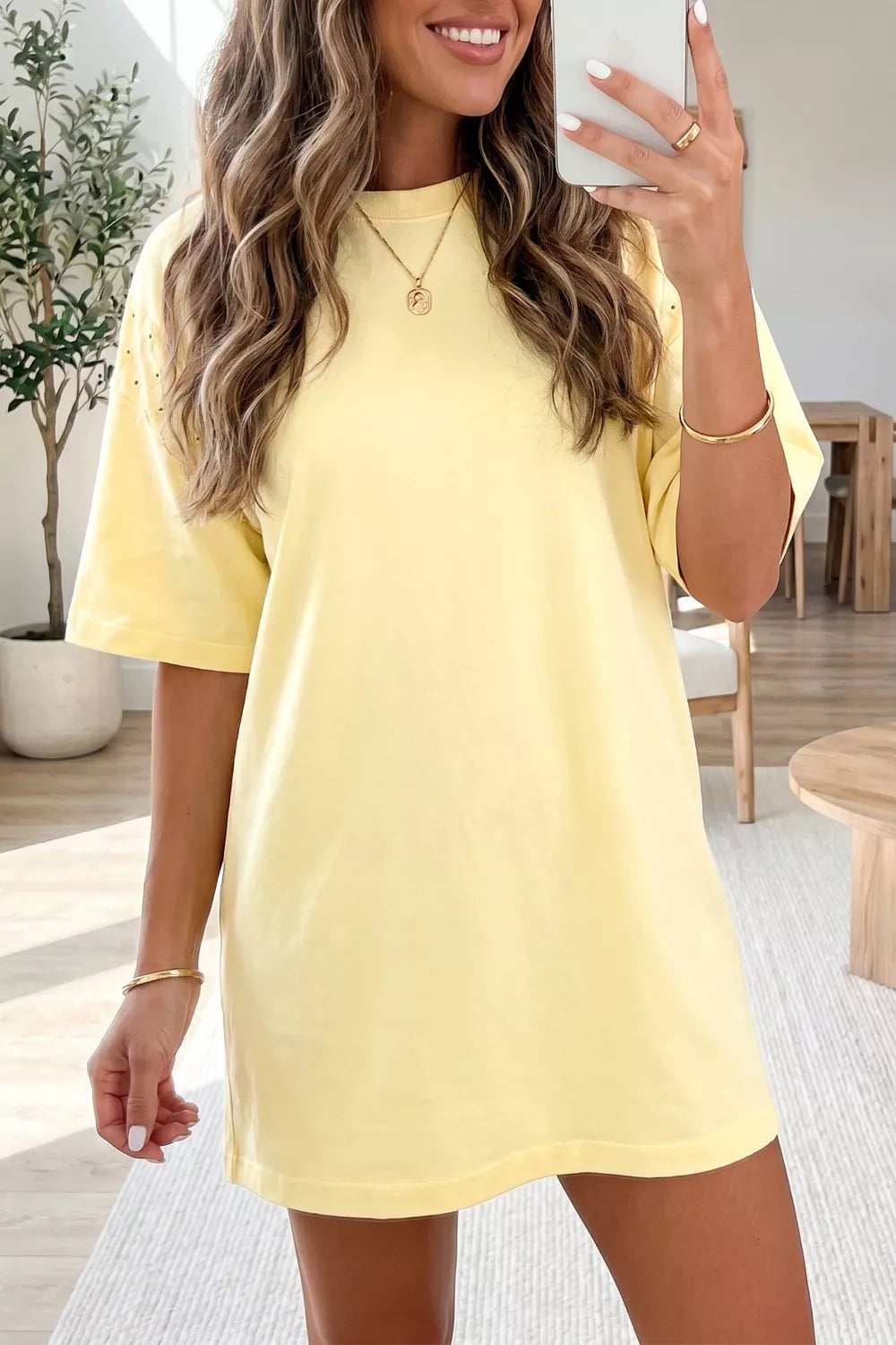 Plush Fashion Hub round neck half sleeve T-shirt dress in soft fabric, casual style, displayed on a hanger.