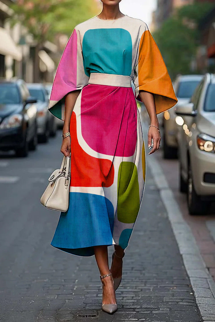 Flowy maxi dress with geometric print, batwing sleeves, casual style from Plush Fashion Hub in size XS to XXXL.