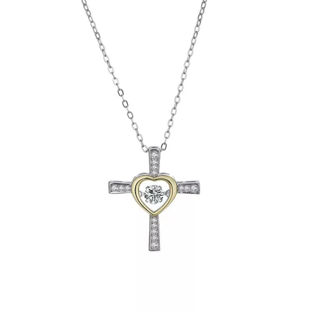 Sterling silver heart cross necklace with delicate chain, showcasing a stylish jewelry piece by Shopimist.