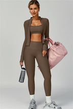 Fitglutes activewear sports bra, jacket, and leggings set featuring a sleek, coordinated workout clothing ensemble for fitness activities.