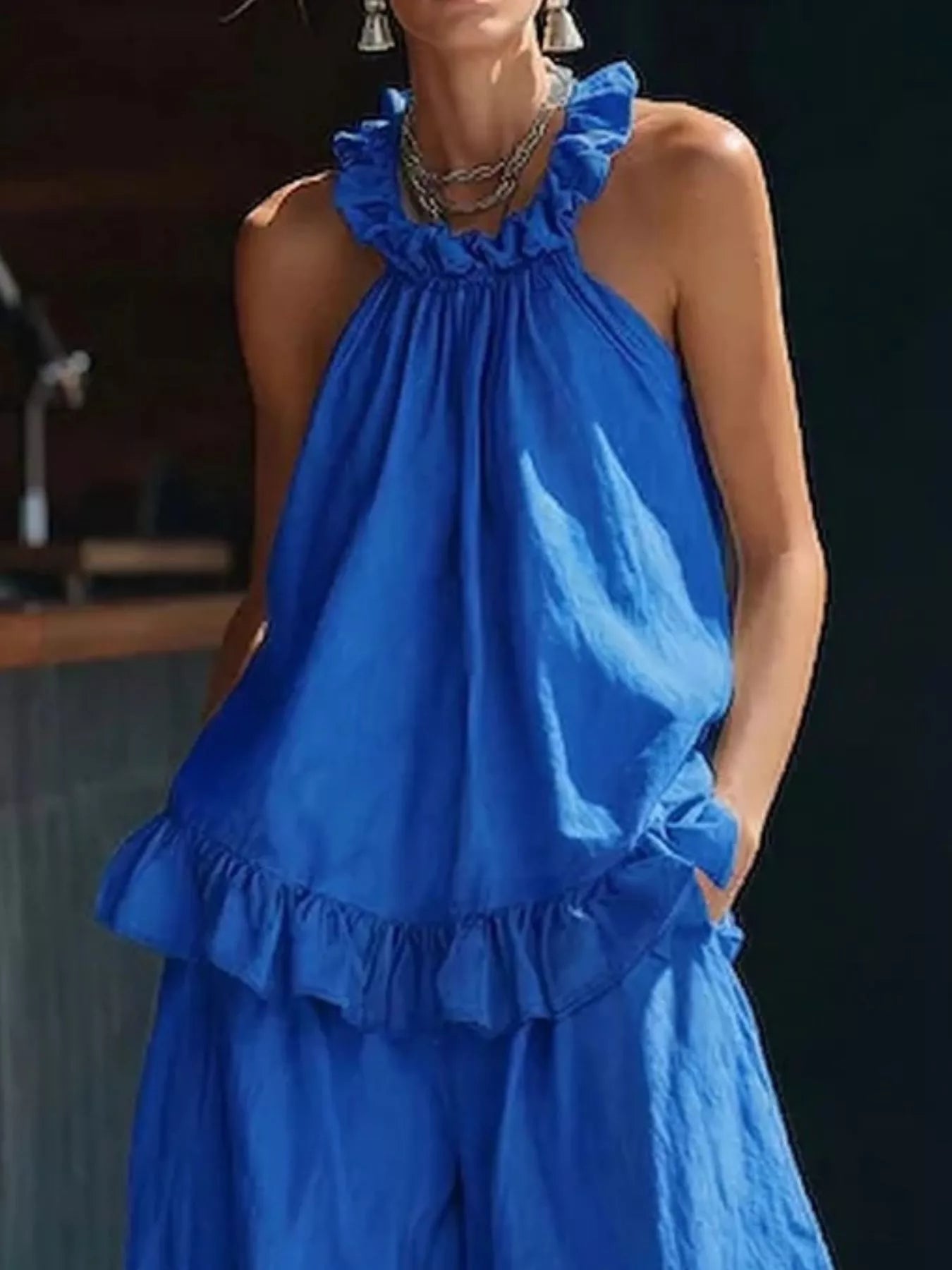 Plus size ruffled halter neck top and wide-leg pants set by Plush Fashion Hub, featuring a stylish, coordinated outfit with ruffle details.