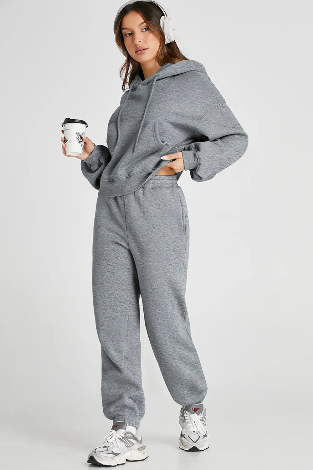 Plush Fashion Hub dropped shoulder hooded top and matching active pants set in soft fabric, casual athletic wear for women.
