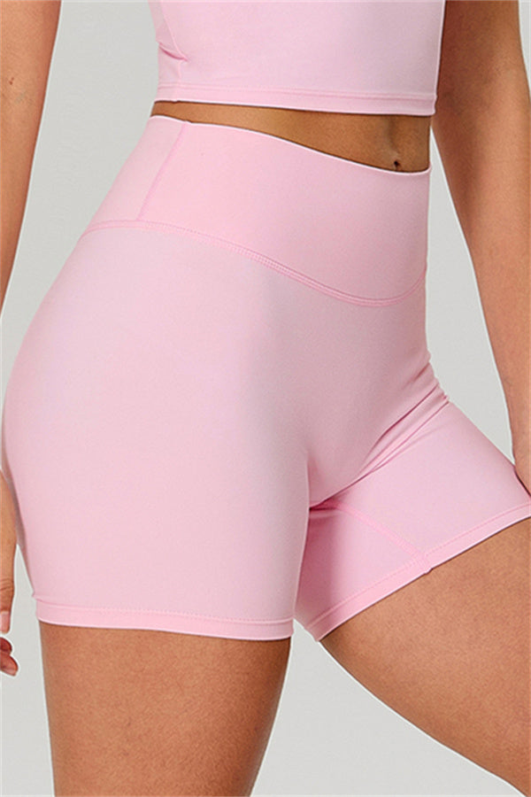 Fitglutes activewear two-piece set with one-shoulder crop top and matching shorts, ideal for gym and workout activities.