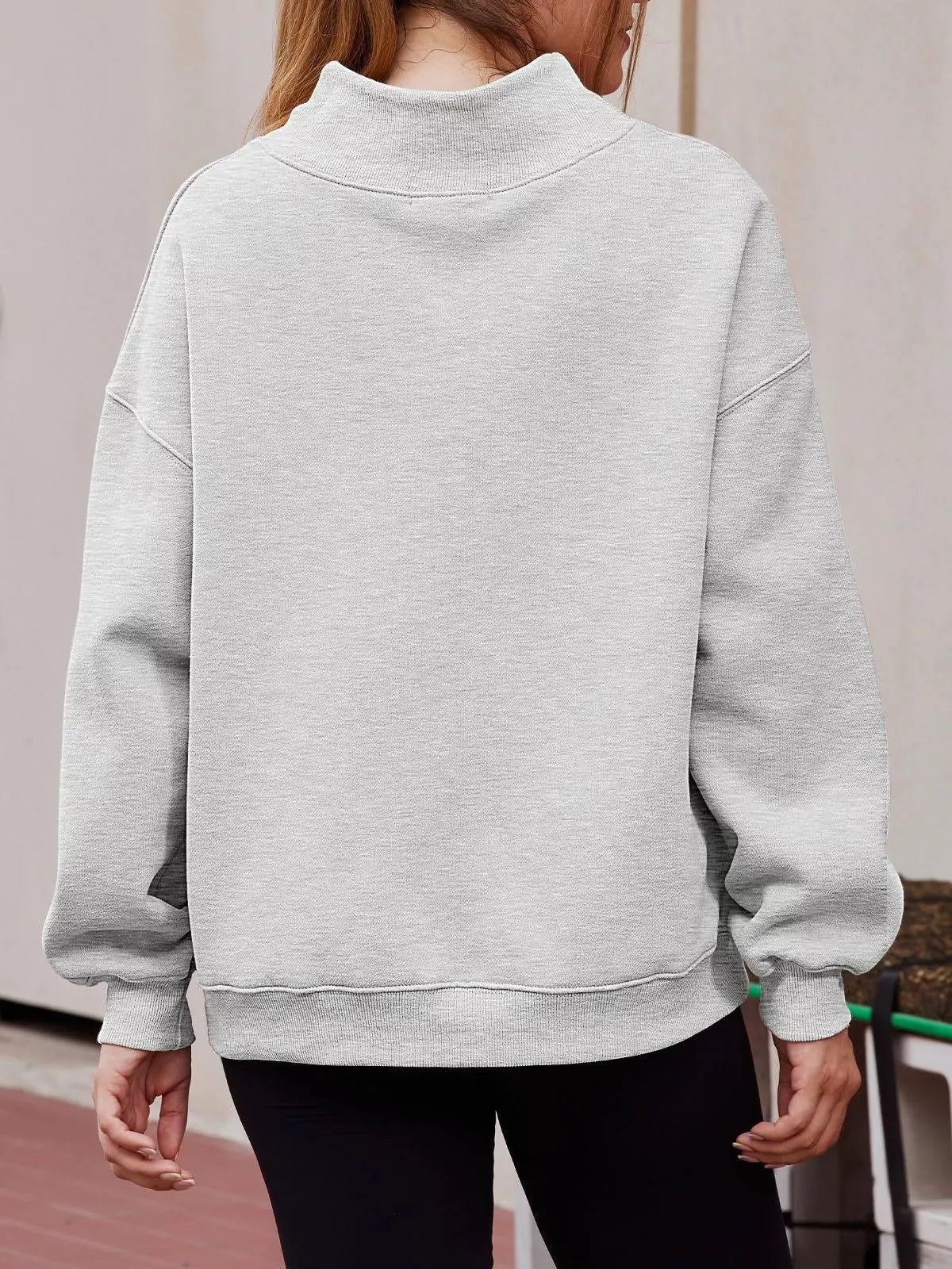 Women's oversized drop shoulder pullover sweatshirt with mock neck, casual fit, trendy top by Trendsi.