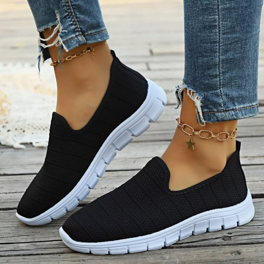 Women's breathable mesh slip-on casual walking flats by Trendsi, lightweight and comfortable for everyday wear.