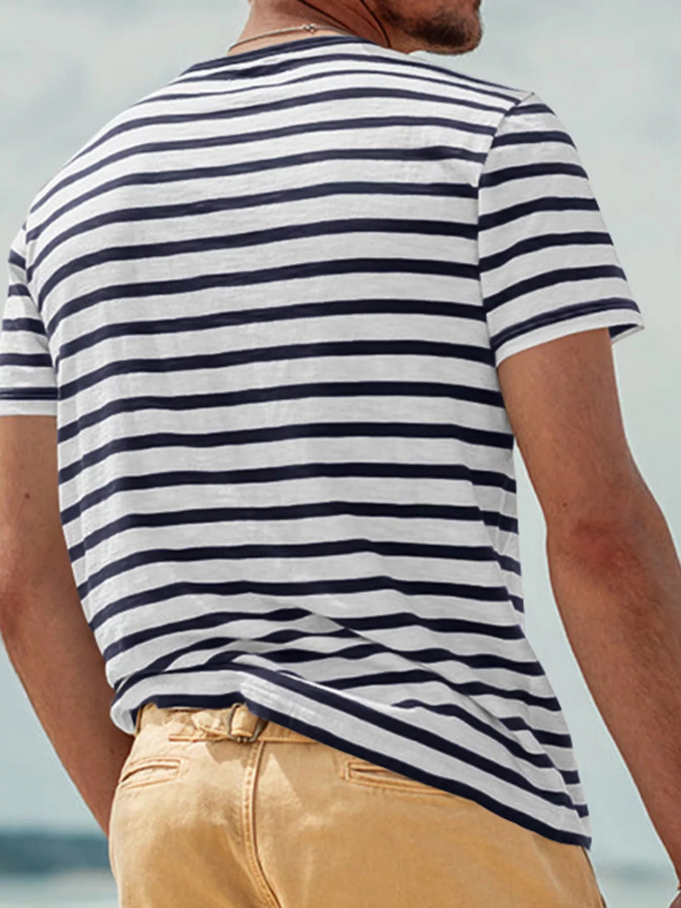 Men's plus size striped pocket short sleeve t-shirt by Plush Fashion Hub, featuring a casual fit and front pocket detail.