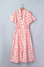 Threaded Pear Talia Zip Up Long Maxi Dress, stylish and elegant full-length dress with zip closure, displayed on a hanger.