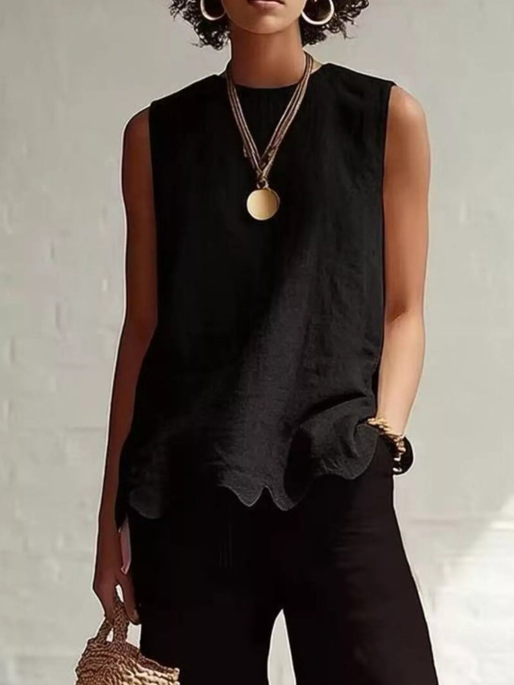 Plus size Shopimist scalloped hem sleeveless tank top with a full size fit, featuring a stylish scalloped neckline and armholes.