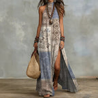 Women's sleeveless floral print maxi dress from FitiqueFit, featuring a split design and vibrant floral pattern.