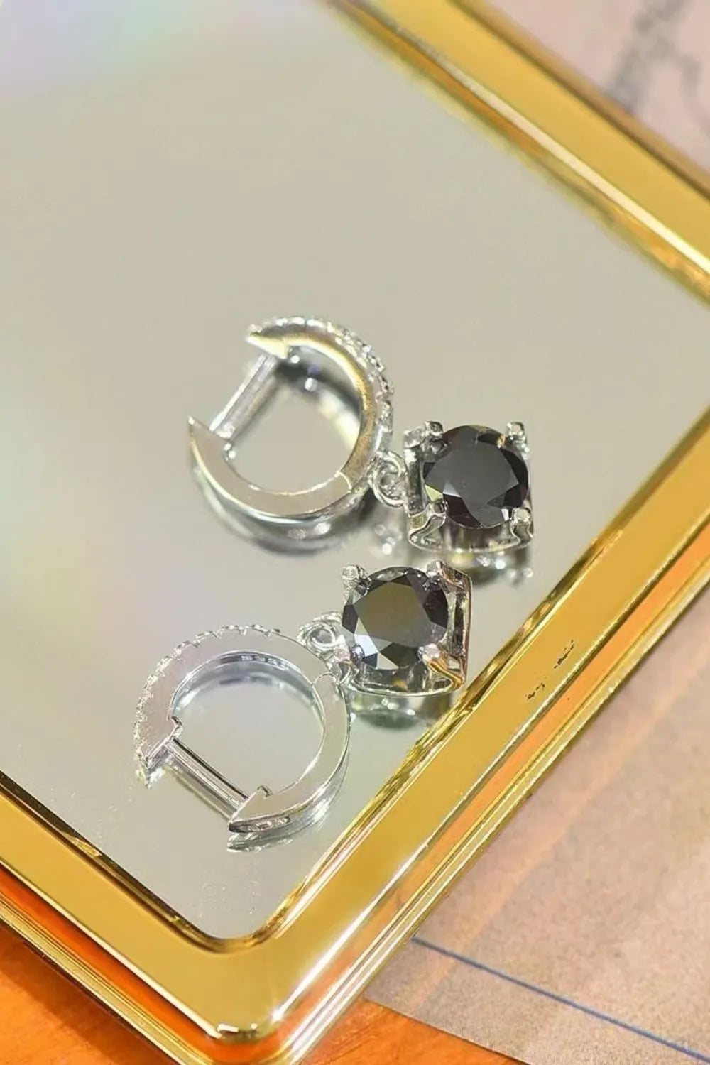 Sterling silver drop earrings with 2 carat moissanite gemstones, elegant and sparkling jewelry for women.