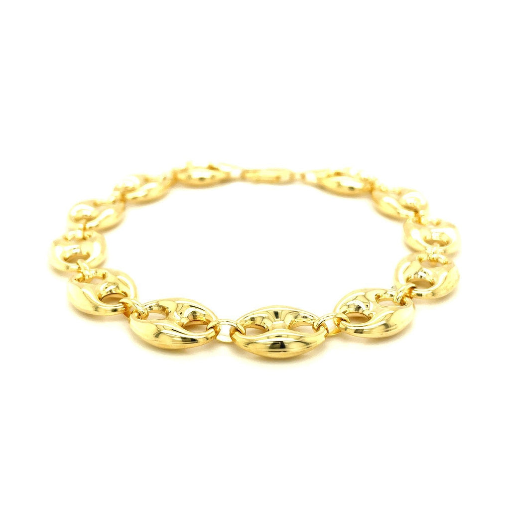 11.0mm 14k yellow gold puffed mariner link bracelet with polished finish, showcasing its elegant, interconnected chain links.