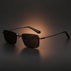 Pure titanium polarized sunglasses with retro British style, featuring sleek frames and dark tinted lenses.