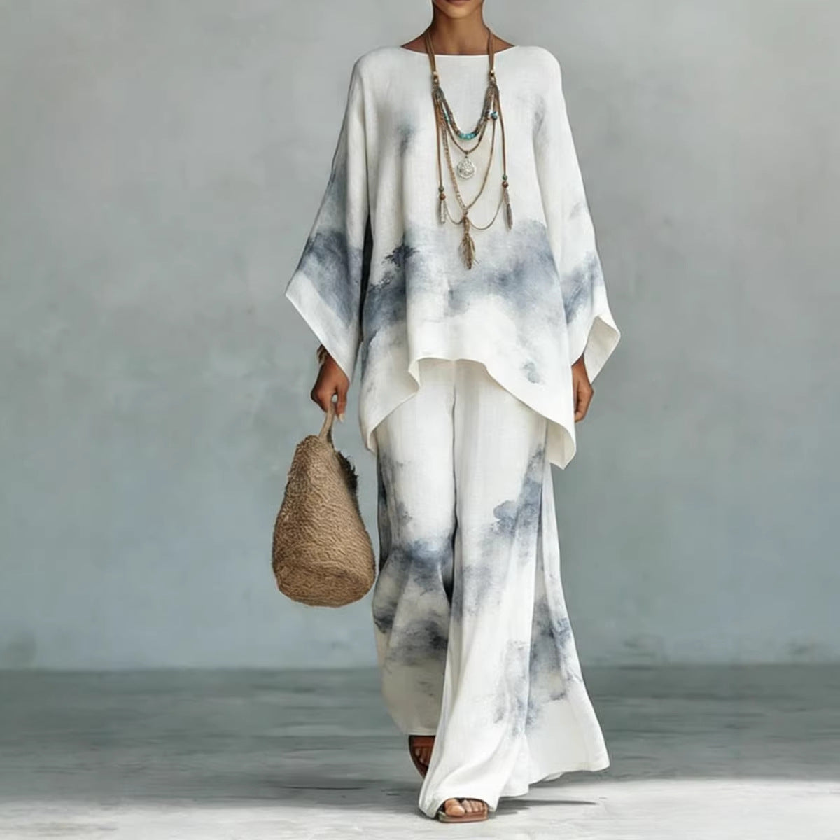 Floral print bamboo linen two-piece set with wide-leg pants by FitiqueFit, showcasing the vibrant floral design and relaxed fit.