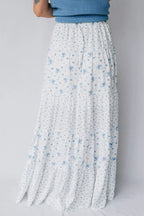 Women's high waisted floral boho maxi skirt with flowy tiered design in viscose fabric, perfect for casual or bohemian style.