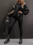 Leopard print trim top and pants set by Simply Love, featuring a stylish matching outfit with animal print details.