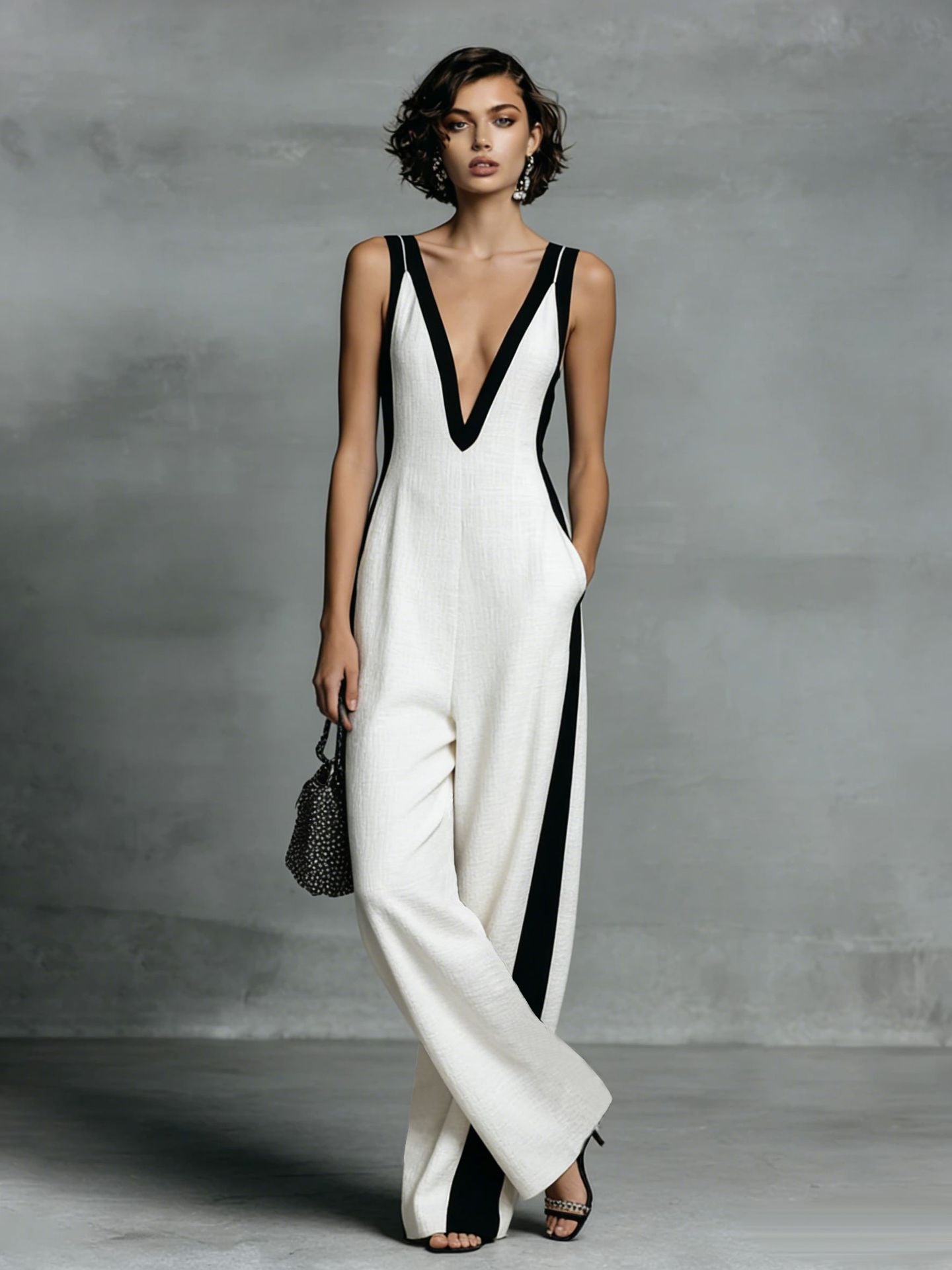 Women's color-block sleeveless V-neck jumpsuit with wide-leg pants, stylish casualwear by Plush Fashion Hub.