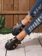 Leather slip-on sandals with adjustable buckle from Shopimist, showcasing a comfortable design and stylish footwear.