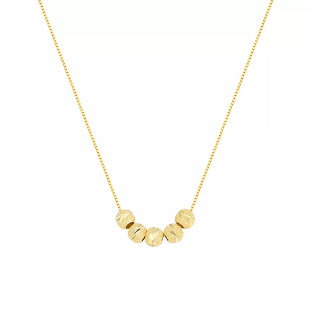 Sterling silver beaded necklace with polished round beads, featuring a delicate design and clasp closure, by Shopimist.