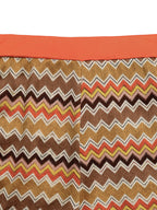 Women’s zigzag knit tank top and shorts two-piece lounge set by Trendsi, featuring a stylish matching knit fabric in a relaxed fit.