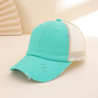 Distressed washed mesh baseball cap with frayed edges, unisex design, suitable for outdoor and daily wear, by Plush Fashion Hub.