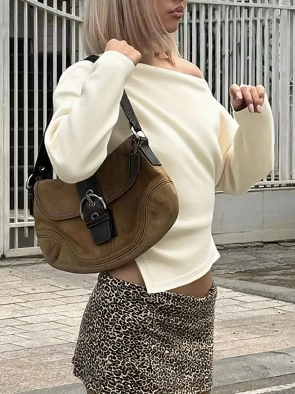 Asymmetrical off-shoulder long sleeve t-shirt by Plush Fashion Hub featuring a stylish, modern design with a relaxed fit.