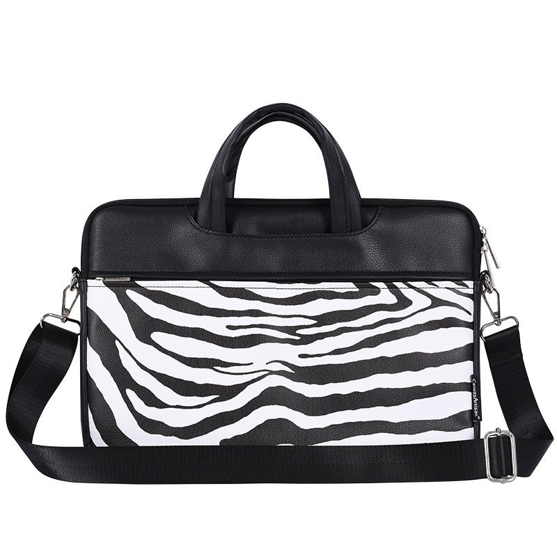 Plush Fashion Hub laptop bag and sleeve with a sleek protective case, designed for carrying and safeguarding laptops.