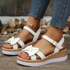 Shopimist Bow open toe wedge sandals featuring a stylish design with a bow detail and a comfortable wedge heel.
