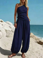 Plus size Shopimist two-piece set featuring a one-shoulder top and wide-leg pants, stylish and comfortable for casual wear.