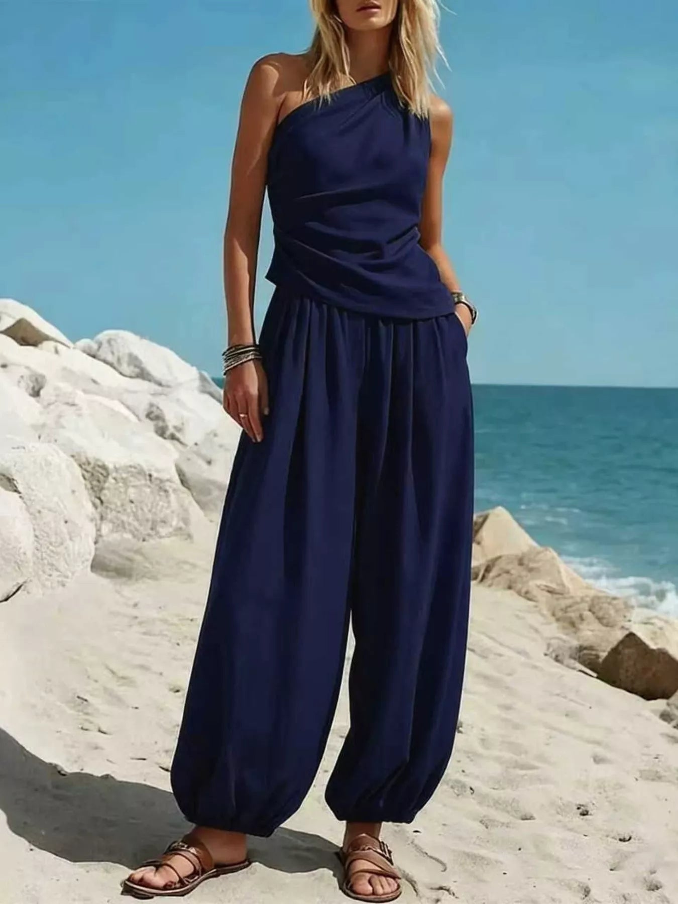 Plus size Shopimist two-piece set featuring a one-shoulder top and wide-leg pants, stylish and comfortable for casual wear.