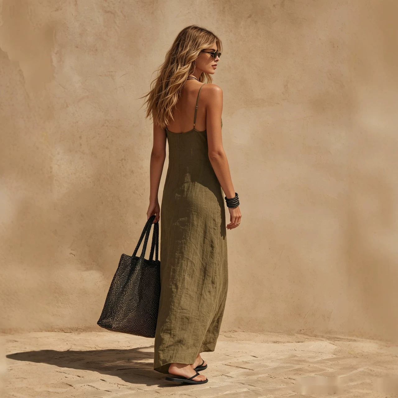 Women's minimalist sleeveless slip dress by Plush Fashion Hub, loose fit casual resort style casualwear, perfect for warm weather.