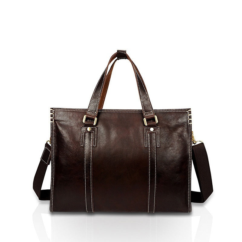First layer cowhide oily leather shoulder messenger bag with adjustable strap and front pocket, crafted by Plush Fashion Hub.