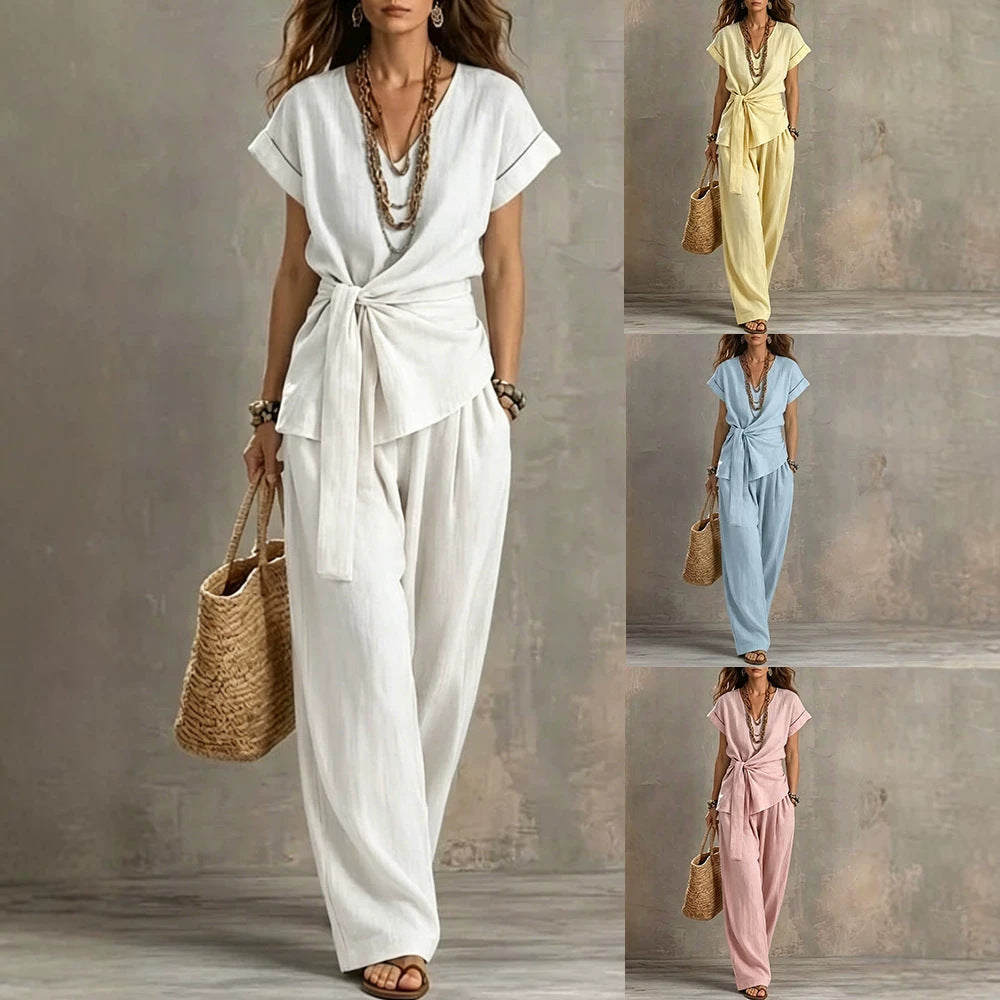 Women’s V-neck short-sleeve top and matching pants two-piece set by Plush Fashion Hub, shown in a casual, stylish fit.