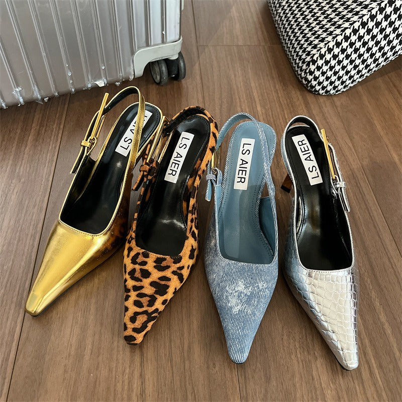 Four pointed-toe slingback heels in gold, leopard print, blue denim, and silver snakeskin with buckle straps.