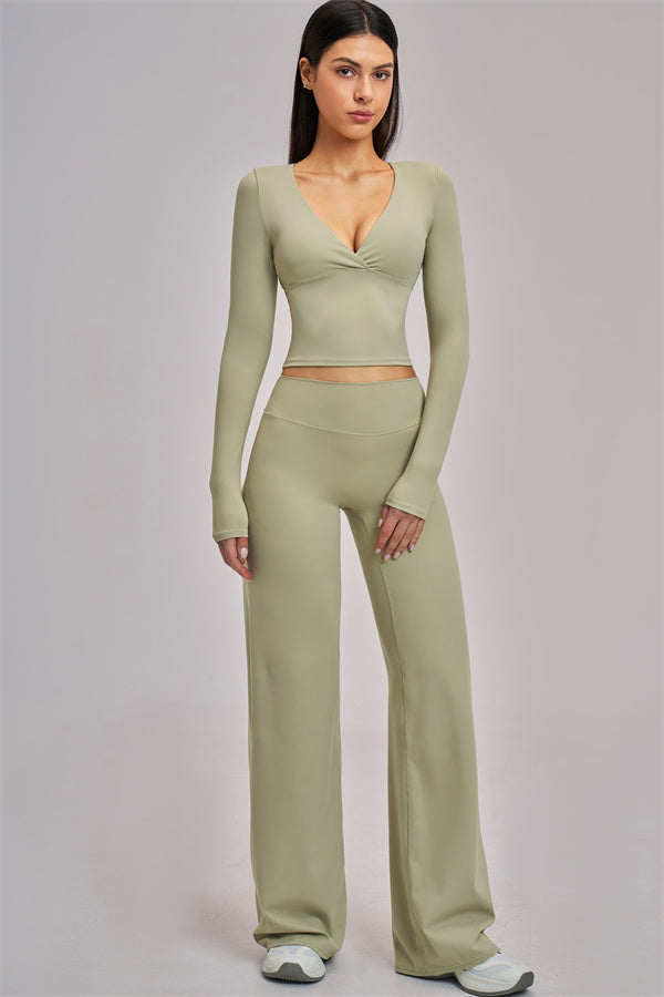 Fitglutes Activewear long sleeve crop top with fitted design, perfect for gym and workout sessions.