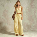 Women's V-neck sleeveless camisole top and wide-leg pants set by FitiqueFit, featuring a stylish, comfortable matching clothing ensemble.