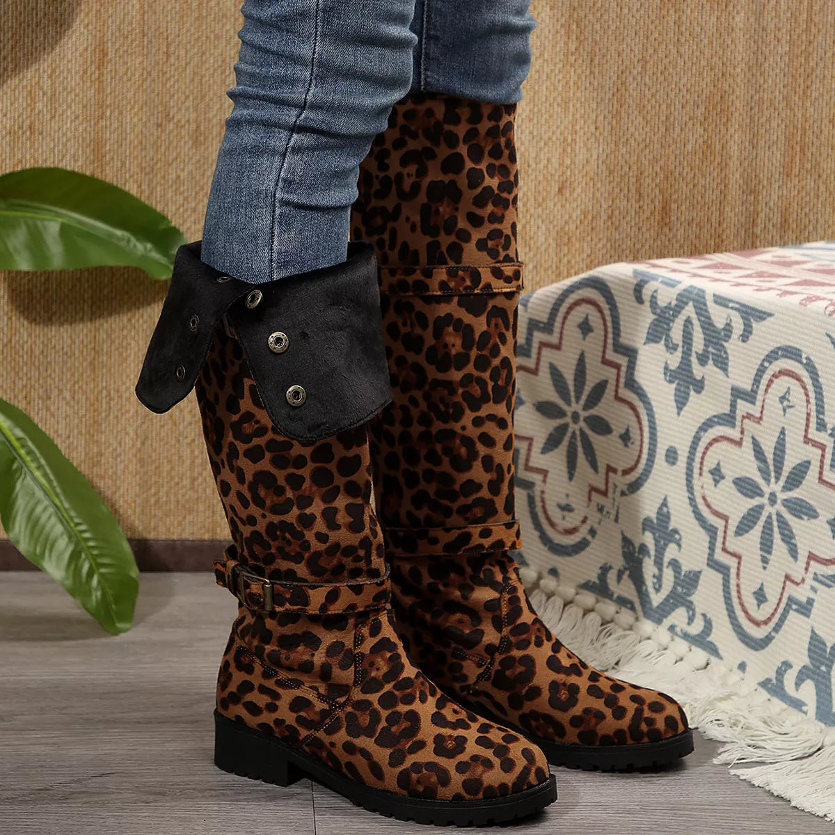 Leopard print block heels boots from Trendsi, stylish footwear with a chunky heel and bold animal print design.