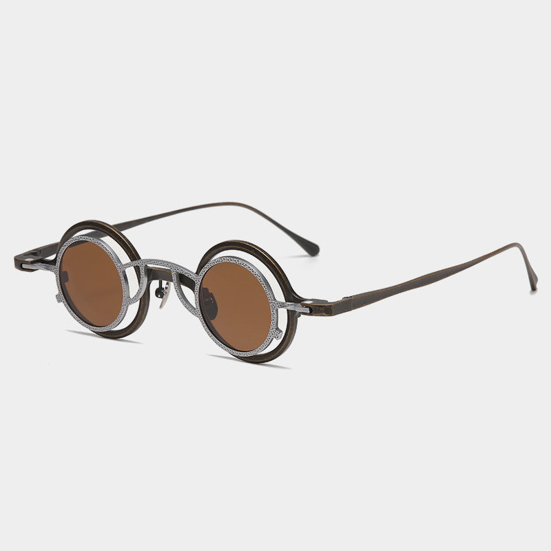 Pure titanium small round sunglasses in retro style with luxury design, featuring sleek metal frames and tinted lenses.