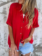 Women's collared half sleeve button-down blouse from Trendsi, featuring a sophisticated office shirt style with tailored fit.