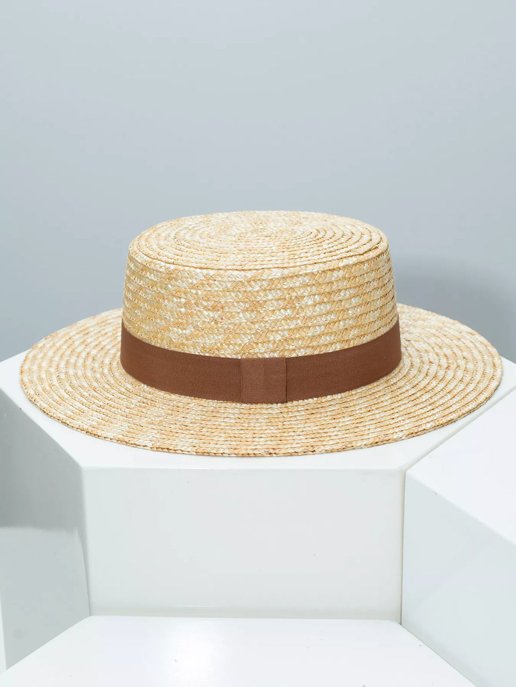 Plush Fashion Hub classic wheat straw boater hat with decorative ribbon, perfect for elegant summer outdoor wear.