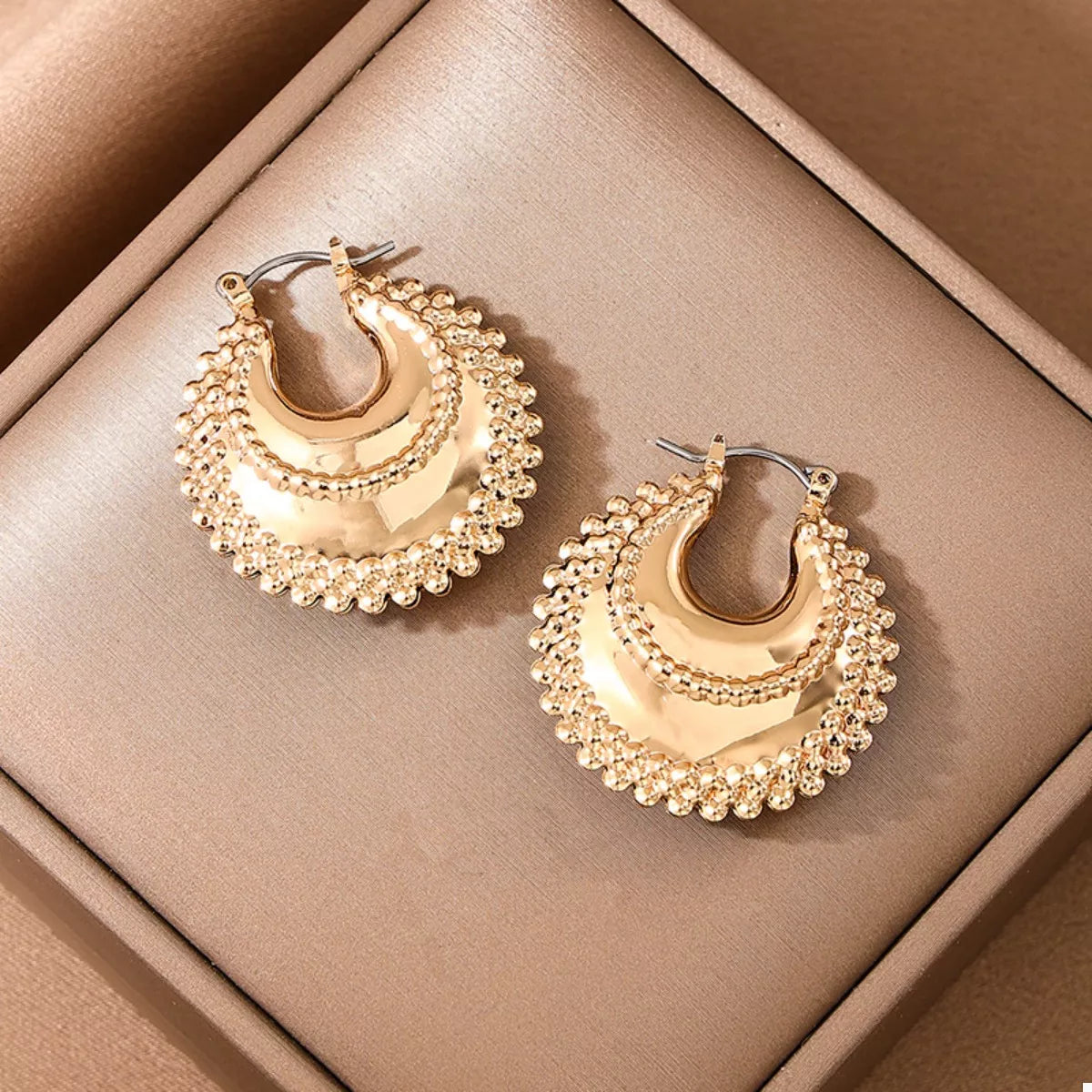 18K gold-plated alloy crescent moon hoop earrings with a sleek, polished finish and lightweight design.